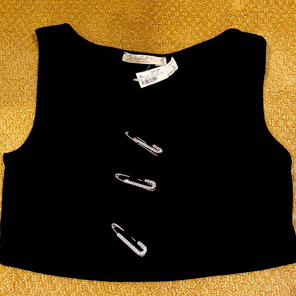 Black crop top with diamond safety pins.